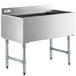 A stainless steel Regency underbar ice bin with a cold plate and bottle holders on legs.