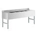 A Regency stainless steel underbar sink with two drainboards.