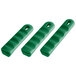 A close-up of a group of green silicone pan handle sleeves.