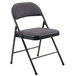 A National Public Seating black metal folding chair with a blue padded seat.