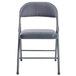 A blue National Public Seating Commercialine folding chair with a blue cushion.