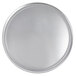 A close-up of a round silver Vollrath pizza pan.