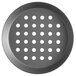 A Vollrath heavy weight round metal pizza pan with holes.