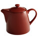 An Acopa Keystone Sedona Orange stoneware teapot with a lid and handle.