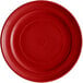 A red Tuxton Concentrix china plate with concentric circles.