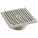 A Zurn polished nickel bronze square drain grate with square openings.