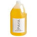 A white PAYA 1 gallon jug of orange shower gel with a yellow label.