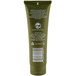 A green Basic Earth Botanicals body wash tube with white text and a flip-top cap.