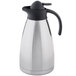 A Tablecraft stainless steel coffee carafe with a black handle.