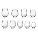 A set of Visions clear plastic stemless wine glasses with measurements.