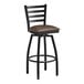 A Lancaster Table & Seating black ladder back swivel bar stool with dark brown vinyl cushion