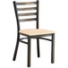 A Lancaster Table & Seating ladder back chair with a natural wood seat.