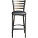 A Lancaster Table & Seating distressed copper finish ladder back bar stool with a black vinyl padded seat.