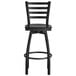 A Lancaster Table & Seating black bar stool with a wooden seat and back.