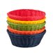 A stack of Tablecraft round rattan bread baskets in assorted colors.