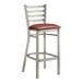 A Lancaster Table & Seating ladder back bar stool with a burgundy vinyl padded seat.
