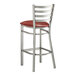 A Lancaster Table & Seating metal ladder back bar stool with a burgundy cushion.