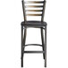A Lancaster Table & Seating distressed copper metal ladder back bar stool with a black wood seat.