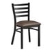 A black Lancaster Table & Seating ladder back chair with a dark brown cushion.