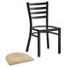 A Lancaster Table & Seating black ladder back chair with natural wood seat
