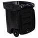 A black Toter rectangular plastic trash bin with wheels and a locking lid.