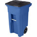 A blue Toter rectangular trash can with a black lid.