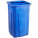 A blue plastic Toter trash can with a lid.