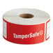 A roll of red TamperSafe labels with white text.