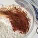 A bowl of flour and Guittard Dutched cocoa powder.