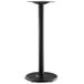 A Lancaster Table & Seating black metal table base with a round base and bar height column.