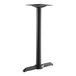 A Lancaster Table & Seating black outdoor table base with a black counter height column.