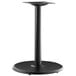 A black metal Lancaster Table & Seating Excalibur outdoor table base with a black pole.