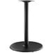 A Lancaster Table & Seating Excalibur black metal table base with a round bar height column.