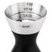 A stainless steel OXO double jigger with 1.5 and 1 oz. measurements.