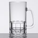 A clear plastic GET beer mug with a handle.