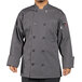 A man wearing a Uncommon Chef Orleans slate gray chef coat.