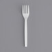 An Eco-Products renewable plant starch fork individually wrapped in white plastic.