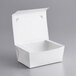 A white Bio-Pak paper take-out box with a windowed open lid.