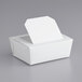 A white Bio-Pak windowed take-out container with a square lid.