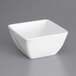 An American Metalcraft white marble square melamine bowl.