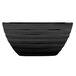 A black rectangular Vollrath stainless steel bowl.