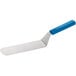 A Dexter-Russell blue and white high heat cake turner with a blue handle.
