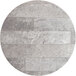 A grey stone circle with white lines on a Lancaster Table & Seating round table top.