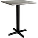 A Lancaster Table & Seating Excalibur square dining height table with a black base and a textured gray top.