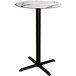 A round Lancaster Table & Seating bar height table with a smooth black base.