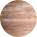 A circular wood surface with a textured Yukon oak finish and cross base plate.