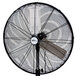 A close-up of a black Royal Sovereign oscillating pedestal fan with a white pole.
