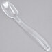 A clear plastic spoon with a long handle.