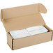 A white cardboard box with white Self-Adhering Customizable Paper Napkin Bands inside.
