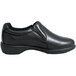 A black Genuine Grip slip-on leather shoe with a rubber sole.